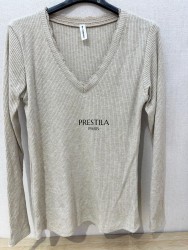 2xWomen's V-neck lurex top,...